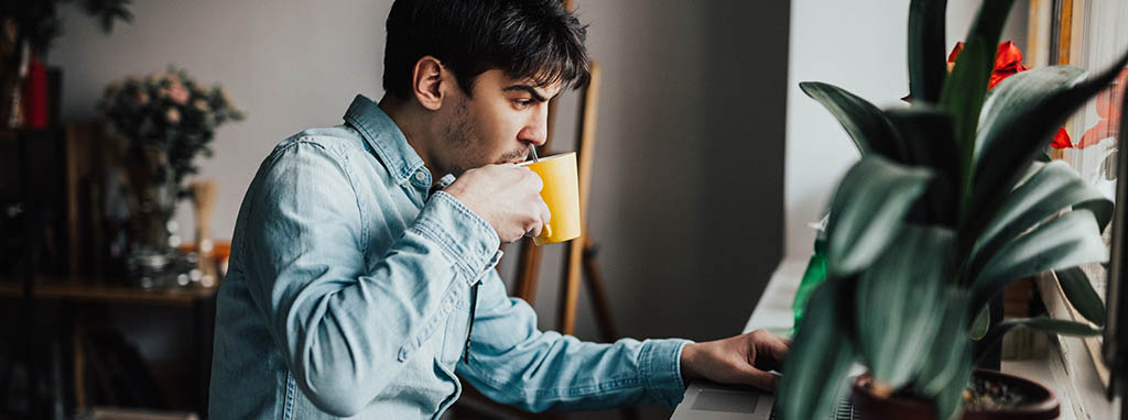 man drinking coffee