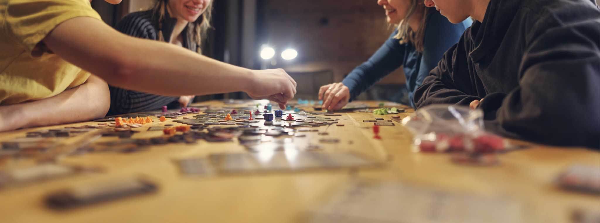 People playing board game