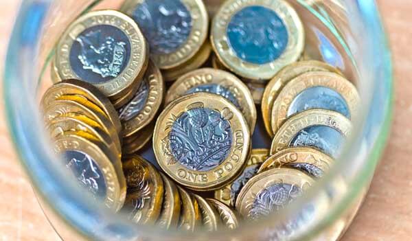 pound coins in a jar